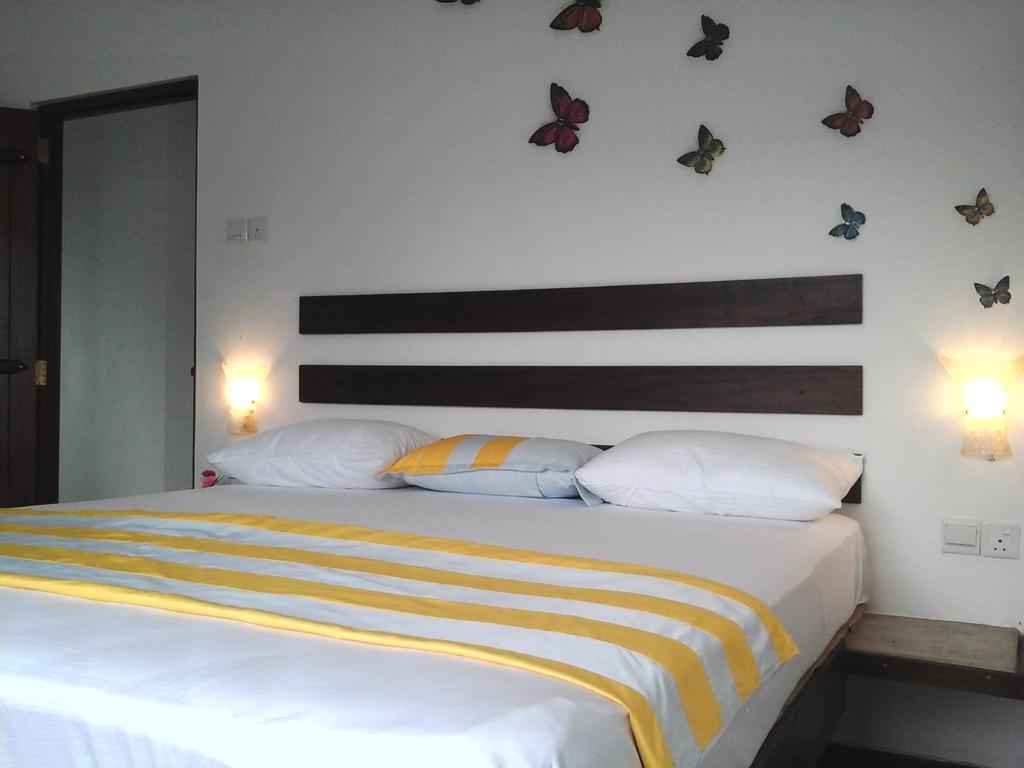 נגומבו Petit Guest House חדר תמונה