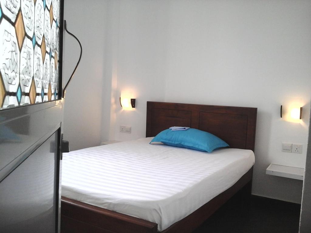 נגומבו Petit Guest House חדר תמונה