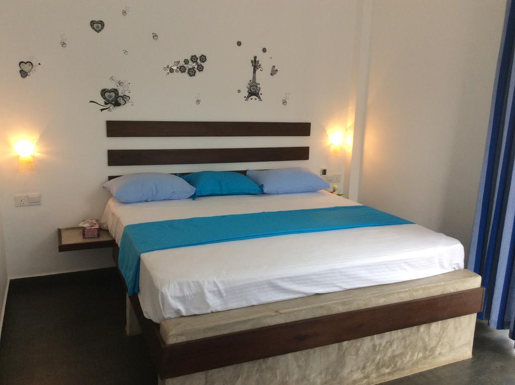 נגומבו Petit Guest House חדר תמונה